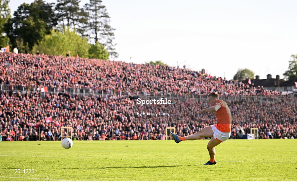 14 May 2023; Rian O'Neill of Armagh strikes a penalty in the penalty shoot-out in the Ulster GAA Football Senior Championship Final match between Armagh and Derry at St Tiernach’s Park in Clones, Monaghan. Photo by Ramsey Cardy/Sportsfile