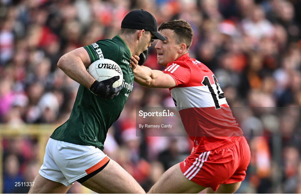 14 May 2023; Armagh goalkeeper Ethan Rafferty in action against Shane McGuigan of Derry during the Ulster GAA Football Senior Championship Final match between Armagh and Derry at St Tiernach’s Park in Clones, Monaghan. Photo by Ramsey Cardy/Sportsfile