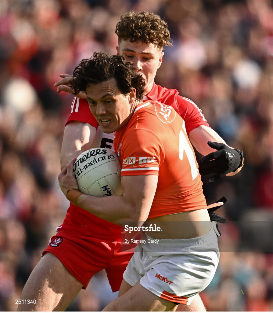 14 May 2023; James Morgan of Armagh in action against Eoghan McEvoy of Derry during the Ulster GAA Football Senior Championship Final match between Armagh and Derry at St Tiernach’s Park in Clones, Monaghan. Photo by Ramsey Cardy/Sportsfile