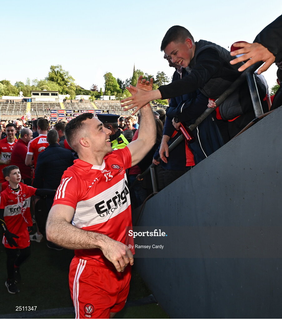 14 May 2023; Niall Toner of Derry celebrates with supporters after the Ulster GAA Football Senior Championship Final match between Armagh and Derry at St Tiernach’s Park in Clones, Monaghan. Photo by Ramsey Cardy/Sportsfile