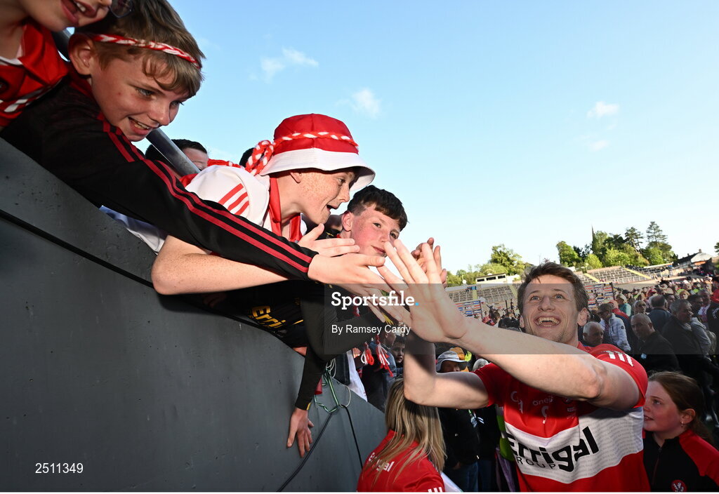 14 May 2023; Brendan Rogers of Derry celebrates with supporters after the Ulster GAA Football Senior Championship Final match between Armagh and Derry at St Tiernach’s Park in Clones, Monaghan. Photo by Ramsey Cardy/Sportsfile