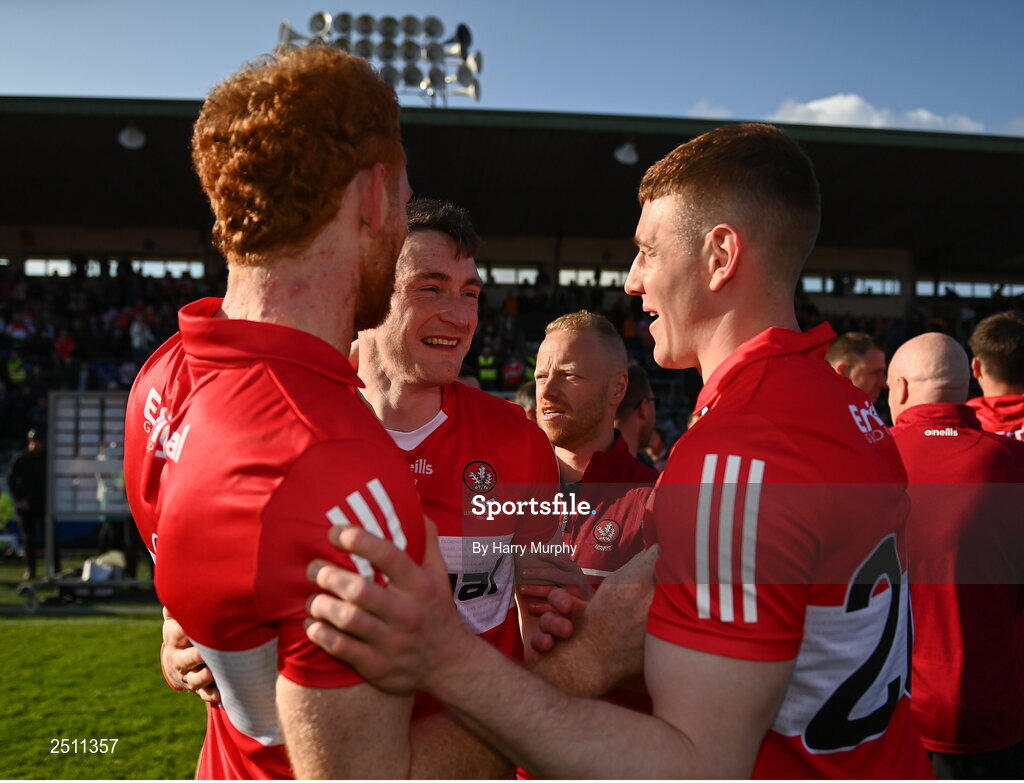 14 May 2023; Derry players, from left, Conor Glass, Gareth McKinless and Lachlan Murray after their side's victory in the Ulster GAA Football Senior Championship Final match between Armagh and Derry at St Tiernach’s Park in Clones, Monaghan. Photo by Harry Murphy/Sportsfile