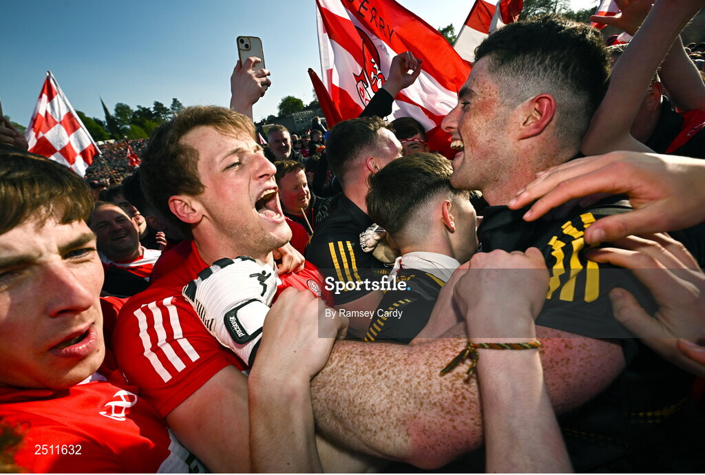 14 May 2023; Derry players Brendan Rogers, left, and goalkeeper Odhran Lynch celebrate after their victory in the Ulster GAA Football Senior Championship Final match between Armagh and Derry at St Tiernach’s Park in Clones, Monaghan. Photo by Ramsey Cardy/Sportsfile