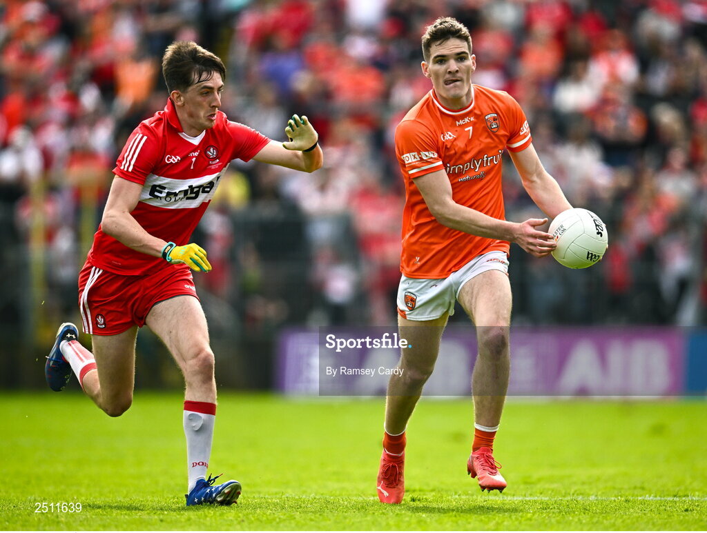 14 May 2023; Jarly Óg Burns of Armagh in action against Paul Cassidy of Derry during the Ulster GAA Football Senior Championship Final match between Armagh and Derry at St Tiernach’s Park in Clones, Monaghan. Photo by Ramsey Cardy/Sportsfile