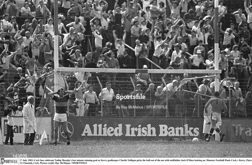 17 July 1983; Cork fans celebrate Tadhg Murphy's last minute winning goal as Kerry goalkeeper Charlie Nelligan picks the ball out of the net with midfielder Jack O'Shea looking on. Munster Football Final, Cork v Kerry, Pairc Ui Chaoimh, Cork. Picture credit; Ray McManus / SPORTSFILE