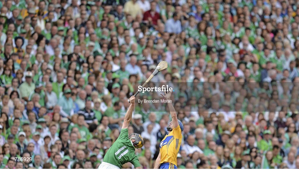 18 August 2013; Conor Ryan, Clare, and James Ryan, Limerick, contest a dropping ball during the game. GAA Hurling All-Ireland Senior Championship, Semi-Final, Limerick v Clare, Croke Park, Dublin. Picture credit: Brendan Moran / SPORTSFILE