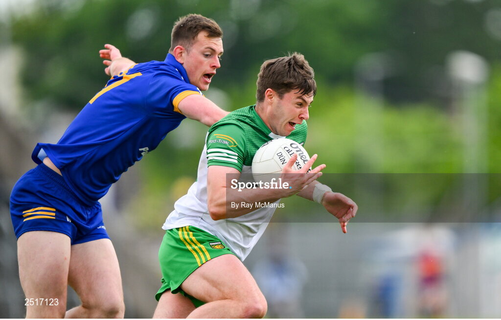 20 May 2023; Conor O'Donnell of Donegal is tackled by Darragh Bohannon of Clare during the GAA Football All-Ireland Senior Championship Round 1 match between Clare and Donegal at Cusack Park in Ennis, Clare. Photo by Ray McManus/Sportsfile