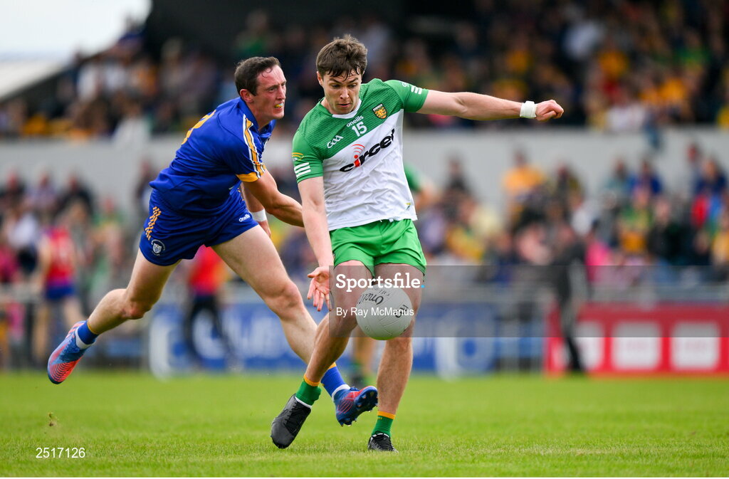 20 May 2023; Conor O'Donnell of Donegal is tackled by Cathal O'Connor of Clare during the GAA Football All-Ireland Senior Championship Round 1 match between Clare and Donegal at Cusack Park in Ennis, Clare. Photo by Ray McManus/Sportsfile