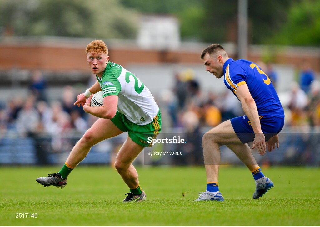 20 May 2023; Oisin Gallen of Donegal in action against Cillian Brennan of Clare during the GAA Football All-Ireland Senior Championship Round 1 match between Clare and Donegal at Cusack Park in Ennis, Clare. Photo by Ray McManus/Sportsfile