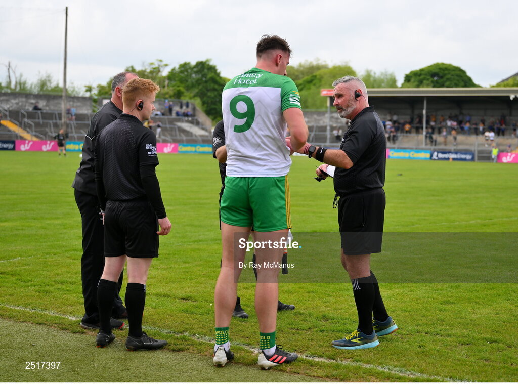 20 May 2023; Rory O'Donnell of Donegal is spoken to by referee James Molloy before being issued a yellow card for taking off his jersey during the GAA Football All-Ireland Senior Championship Round 1 match between Clare and Donegal at Cusack Park in Ennis, Clare. Photo by Ray McManus/Sportsfile