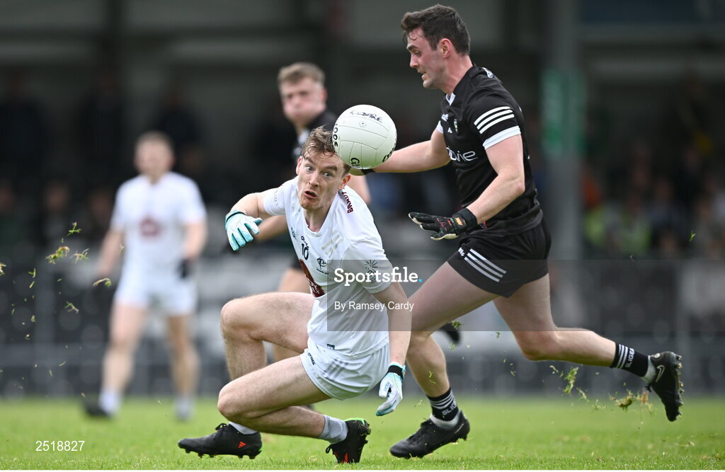 21 May 2023; Paddy McDermott of Kildare in action against Finnian Cawley of Sligo during the GAA Football All-Ireland Senior Championship Round 1 match between Sligo and Kildare at Markievicz Park in Sligo. Photo by Ramsey Cardy/Sportsfile