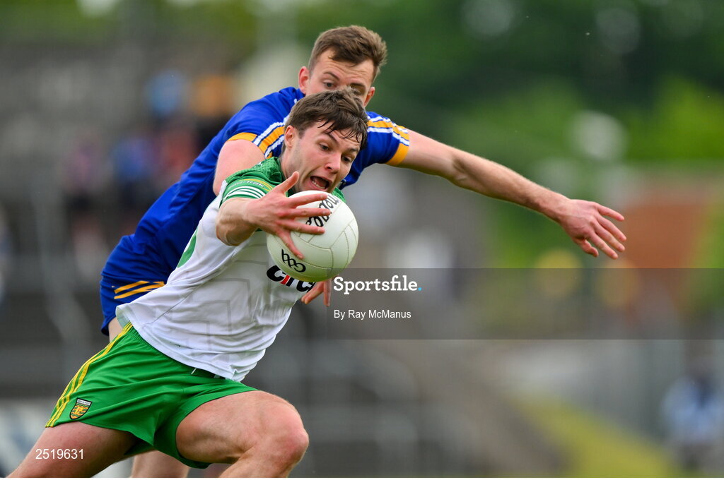 20 May 2023;Conor O'Donnell of Donegal is tackled by Darragh Bohannon of Clare during the GAA Football All-Ireland Senior Championship Round 1 match between Clare and Donegal at Cusack Park in Ennis, Clare. Photo by Ray McManus/Sportsfile