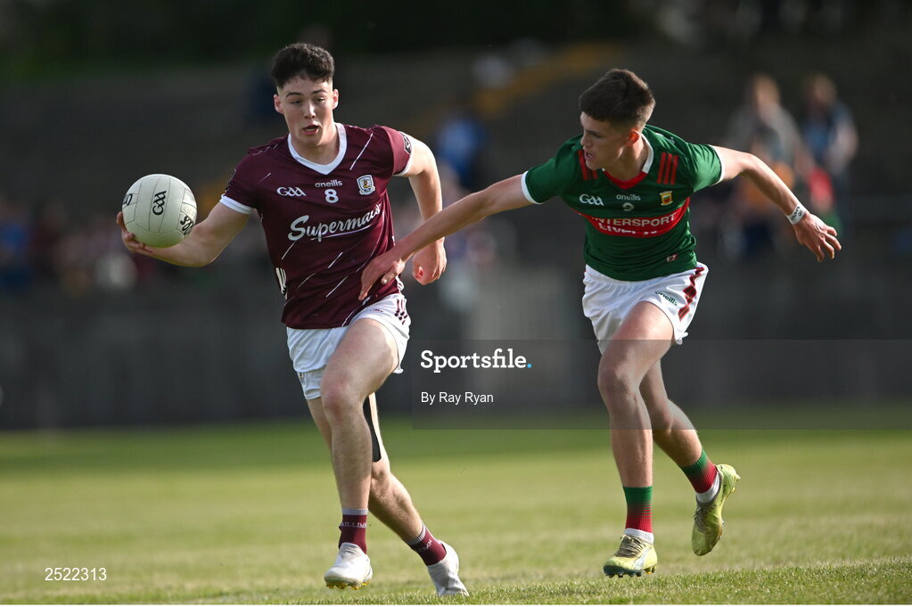 26 May 2023; Shay McGlinchey of Galway in action against Shane Cunningham of Mayo during the 2023 Electric Ireland Connacht GAA Football Minor Championship Final between Galway and Mayo at Tuam Stadium in Galway. Photo by Ray Ryan/Sportsfile