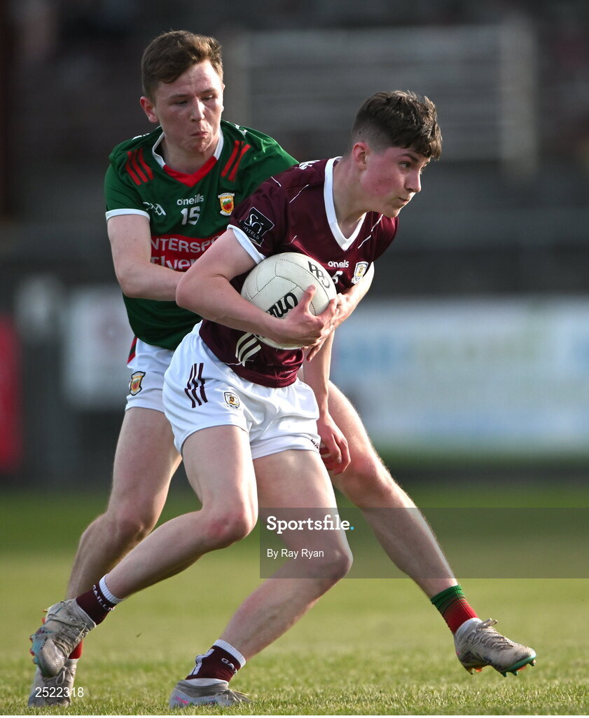 26 May 2023; Brian O'Malley of Galway in action against Senan Guilfoyle of Mayo during the 2023 Electric Ireland Connacht GAA Football Minor Championship Final between Galway and Mayo at Tuam Stadium in Galway. Photo by Ray Ryan/Sportsfile