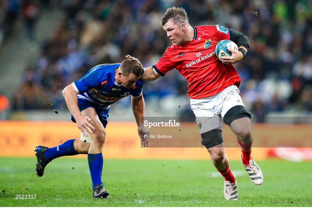 27 May 2023; Peter O'Mahony of Munster is tackled by Deon Fourie of DHL Stormers during the United Rugby Championship Final match between DHL Stormers and Munster at DHL Stadium in Cape Town, South Africa. Photo by Nic Bothma/Sportsfile