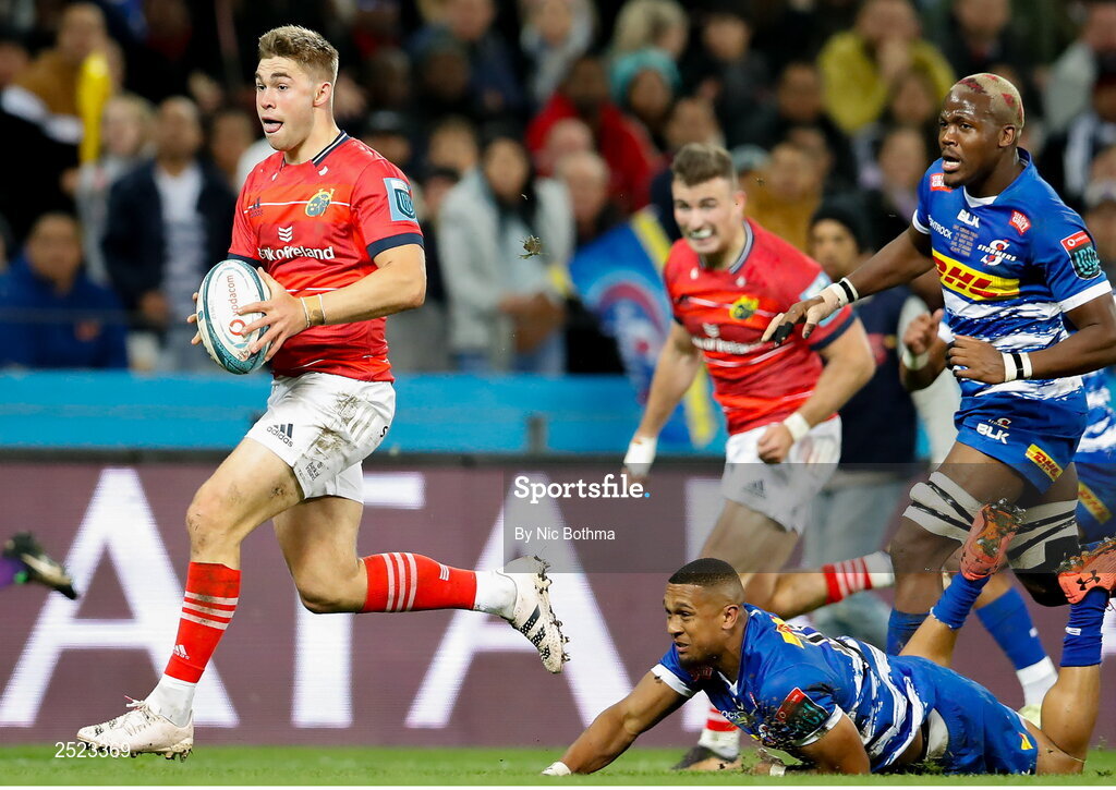 27 May 2023; Jack Crowley of Munster breaks away from Leolin Zas of DHL Stormers during the United Rugby Championship Final match between DHL Stormers and Munster at DHL Stadium in Cape Town, South Africa. Photo by Nic Bothma/Sportsfile