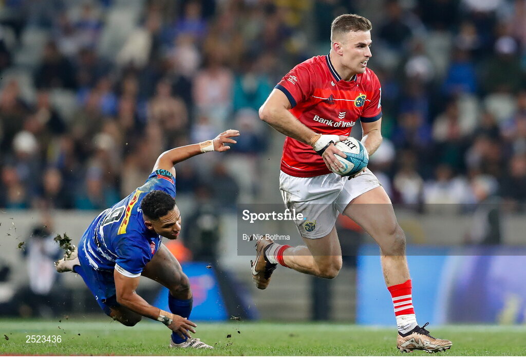 27 May 2023; Shane Daly of Munster makes a break past Herschel Jantjies of DHL Stormers during the United Rugby Championship Final match between DHL Stormers and Munster at DHL Stadium in Cape Town, South Africa. Photo by Nic Bothma/Sportsfile