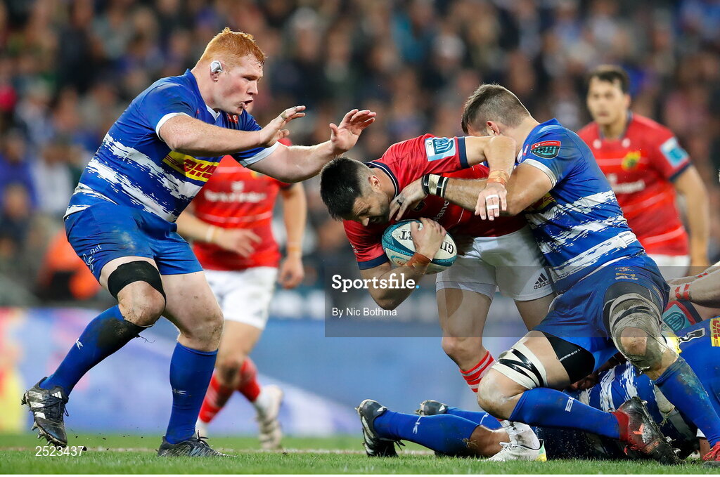27 May 2023; Conor Murray of Munster is tackled by Steven Kitshoff, left, and Ruben van Heerden of DHL Stormers during the United Rugby Championship Final match between DHL Stormers and Munster at DHL Stadium in Cape Town, South Africa. Photo by Nic Bothma/Sportsfile
