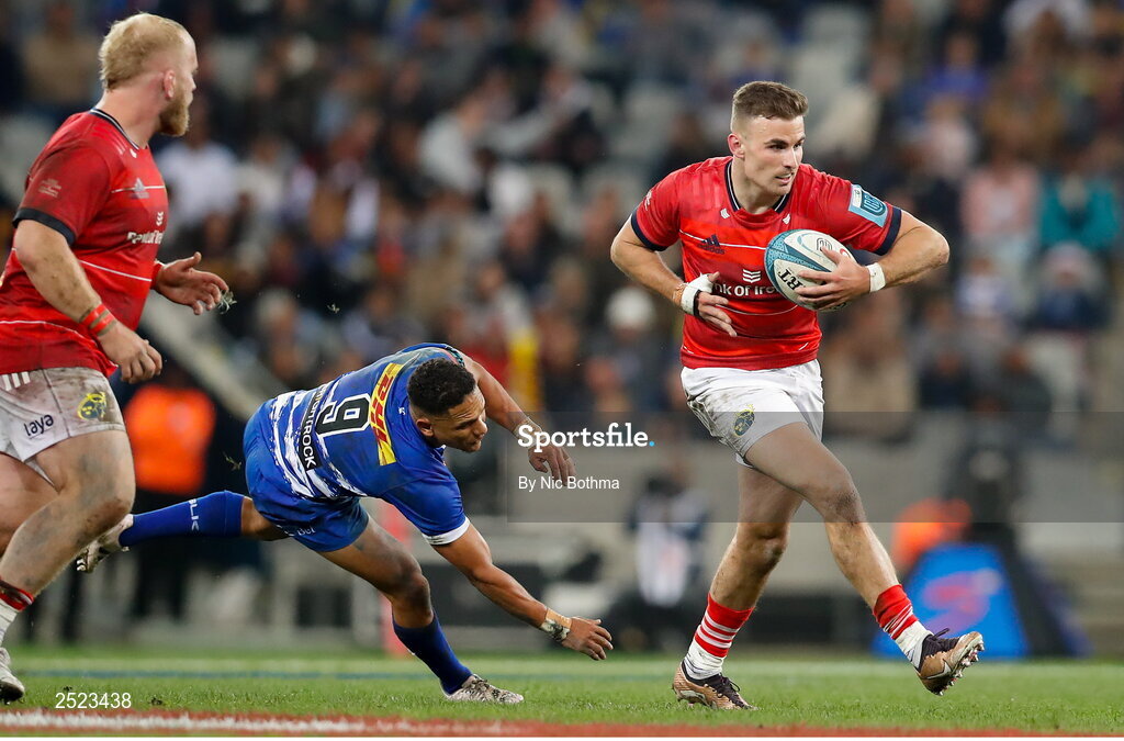 27 May 2023; Shane Daly of Munster beats the tackle of Herschel Jantjies of DHL Stormers during the United Rugby Championship Final match between DHL Stormers and Munster at DHL Stadium in Cape Town, South Africa. Photo by Nic Bothma/Sportsfile