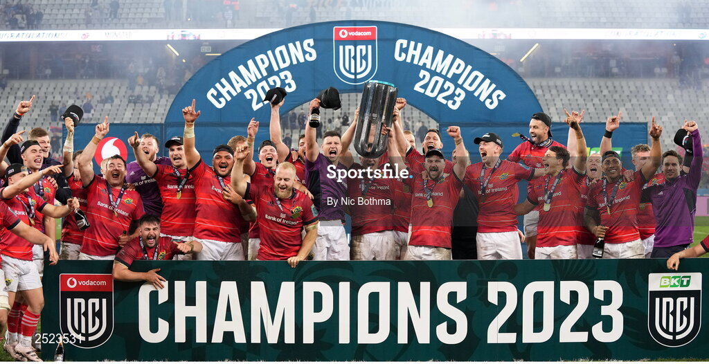 27 May 2023; Munster players celebrate with the trophy after victory in the United Rugby Championship Final match between DHL Stormers and Munster at DHL Stadium in Cape Town, South Africa. Photo by Nic Bothma/Sportsfile