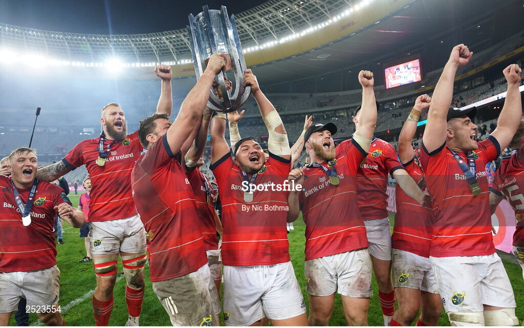 27 May 2023; Munster players, from left, Gavin Coombes, RG Snyman, Niall Scannell, Roman Salanoa, Jeremy Loughman, and Alex Kendellen celebrate with the trophy after winning the United Rugby Championship Final match between DHL Stormers and Munster at DHL Stadium in Cape Town, South Africa. Photo by Nic Bothma/Sportsfile