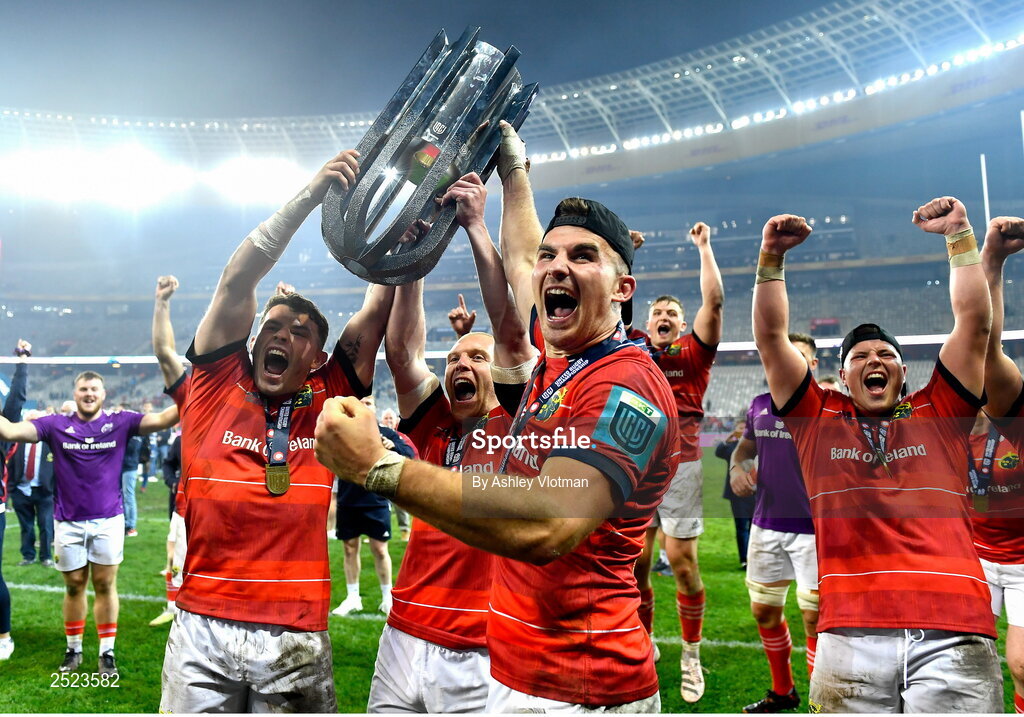 27 May 2023; Munster players, from left, Calvin Nash, Keith Earls, Shane Daly and Josh Wycherley celebrate with the trophy after the United Rugby Championship Final match between DHL Stormers and Munster at DHL Stadium in Cape Town, South Africa. Photo by Ashley Vlotman/Sportsfile
