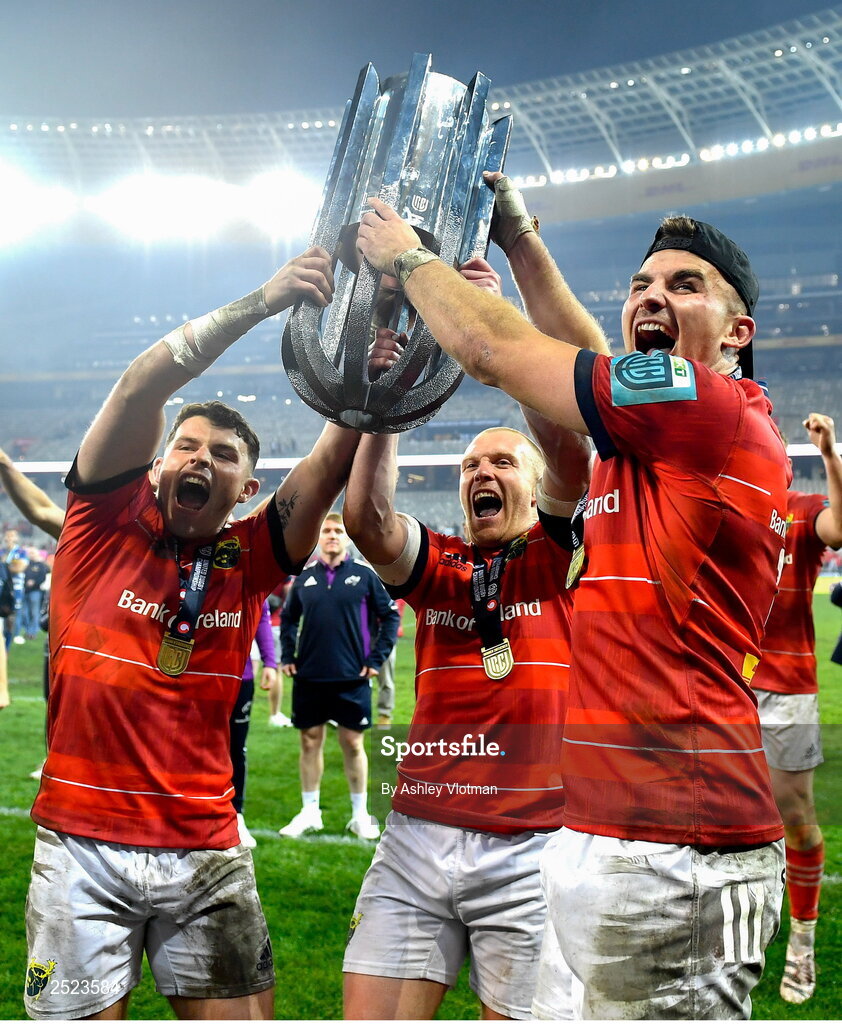 27 May 2023; Munster players, from left, Calvin Nash, Keith Earls and Shane Daly celebrate with the trophy after the United Rugby Championship Final match between DHL Stormers and Munster at DHL Stadium in Cape Town, South Africa. Photo by Ashley Vlotman/Sportsfile