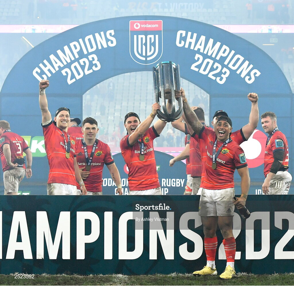 27 May 2023; Munster players, from left, Mike Haley, Calvin Nash, Jack Crowley and Malakai Fekitoa celebrate with the trophy after the United Rugby Championship Final match between DHL Stormers and Munster at DHL Stadium in Cape Town, South Africa. Photo by Ashley Vlotman/Sportsfile