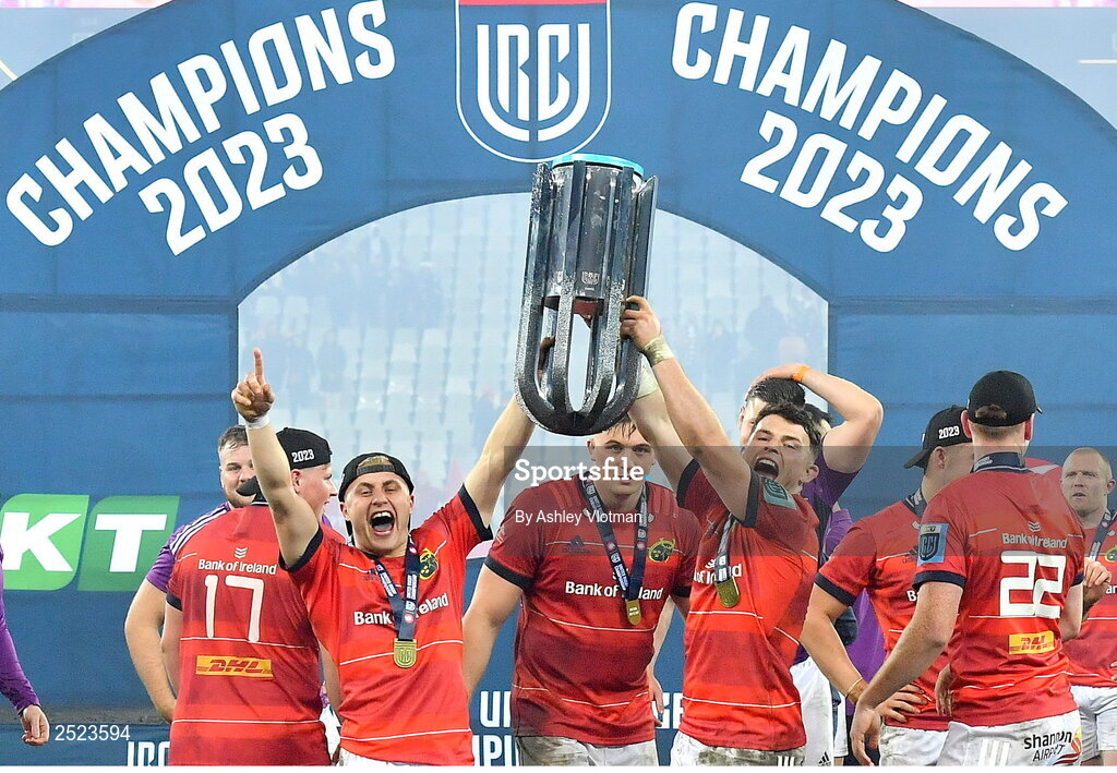 27 May 2023; Munster players, from left, Craig Casey, left, and Calvin Nash celebrate with the trophy after the United Rugby Championship Final match between DHL Stormers and Munster at DHL Stadium in Cape Town, South Africa. Photo by Ashley Vlotman/Sportsfile