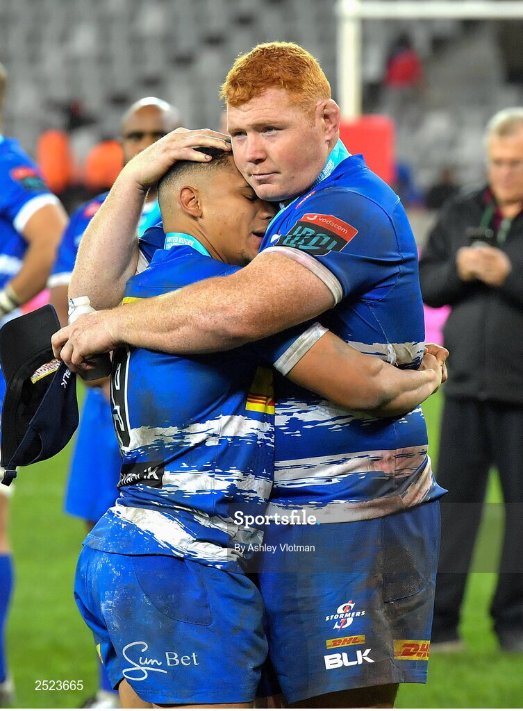 27 May 2023; Dejected DHL Stormers players, Herschel Jantjies, left, and Steven Kitshoff after the United Rugby Championship Final match between DHL Stormers and Munster at DHL Stadium in Cape Town, South Africa. Photo by Ashley Vlotman/Sportsfile