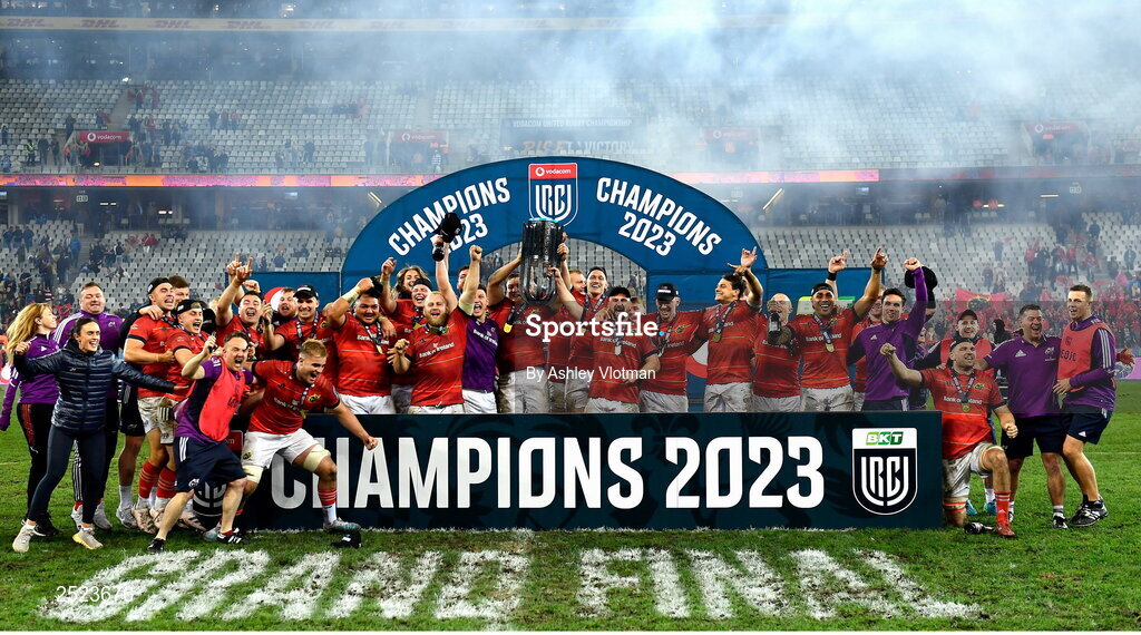 27 May 2023; Munster players celebrate with the trophy after the United Rugby Championship Final match between DHL Stormers and Munster at DHL Stadium in Cape Town, South Africa. Photo by Ashley Vlotman/Sportsfile