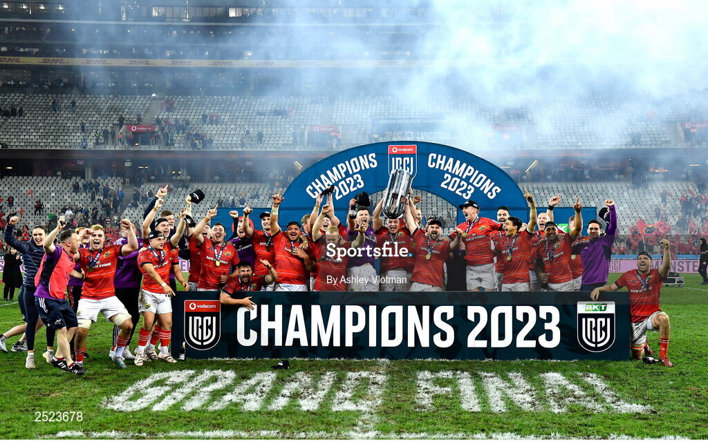 27 May 2023; Munster players celebrate with the trophy after the United Rugby Championship Final match between DHL Stormers and Munster at DHL Stadium in Cape Town, South Africa. Photo by Ashley Vlotman/Sportsfile