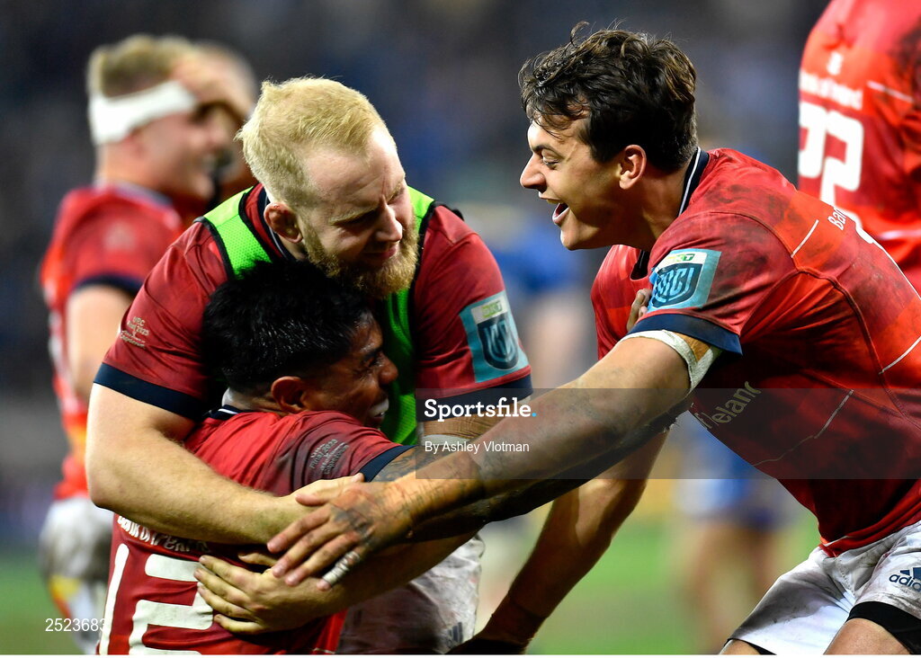 27 May 2023; Munstr players, from left, Malakai Fekitoa, Jeremy Loughman and Antoine Frisch celebrate at the final whistle of the United Rugby Championship Final match between DHL Stormers and Munster at DHL Stadium in Cape Town, South Africa. Photo by Ashley Vlotman/Sportsfile
