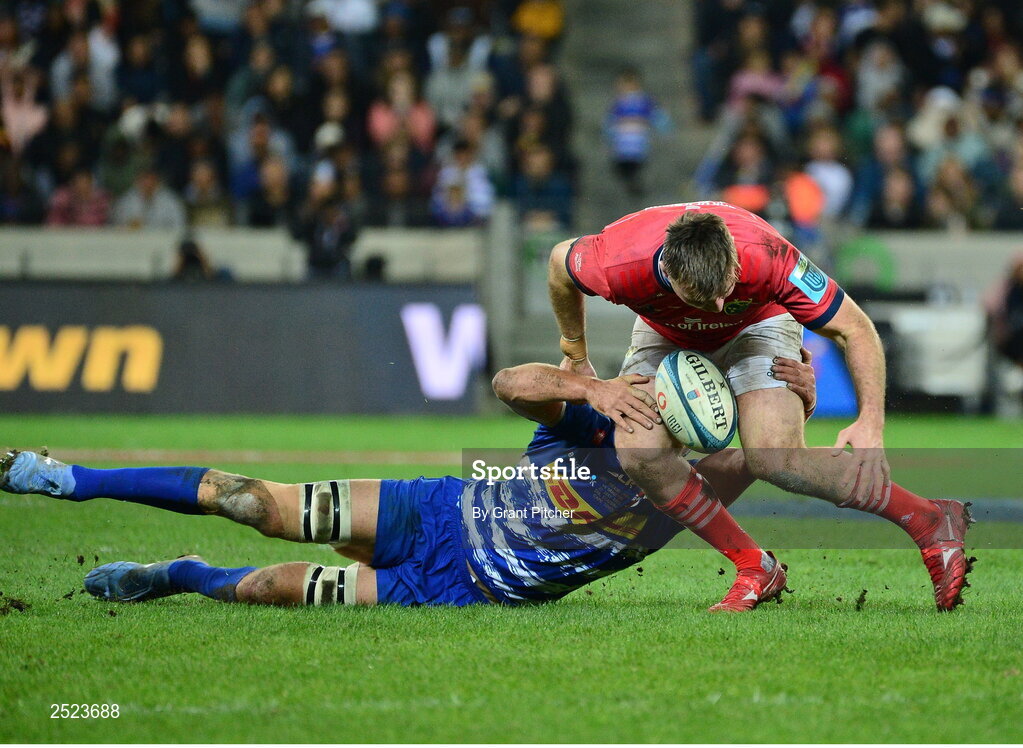 27 May 2023; Niall Scannell of Munster is tackled by Ben-Jason Dixon of DHL Stormers during the United Rugby Championship Final match between DHL Stormers and Munster at DHL Stadium in Cape Town, South Africa. Photo by Grant Pitcher/Sportsfile