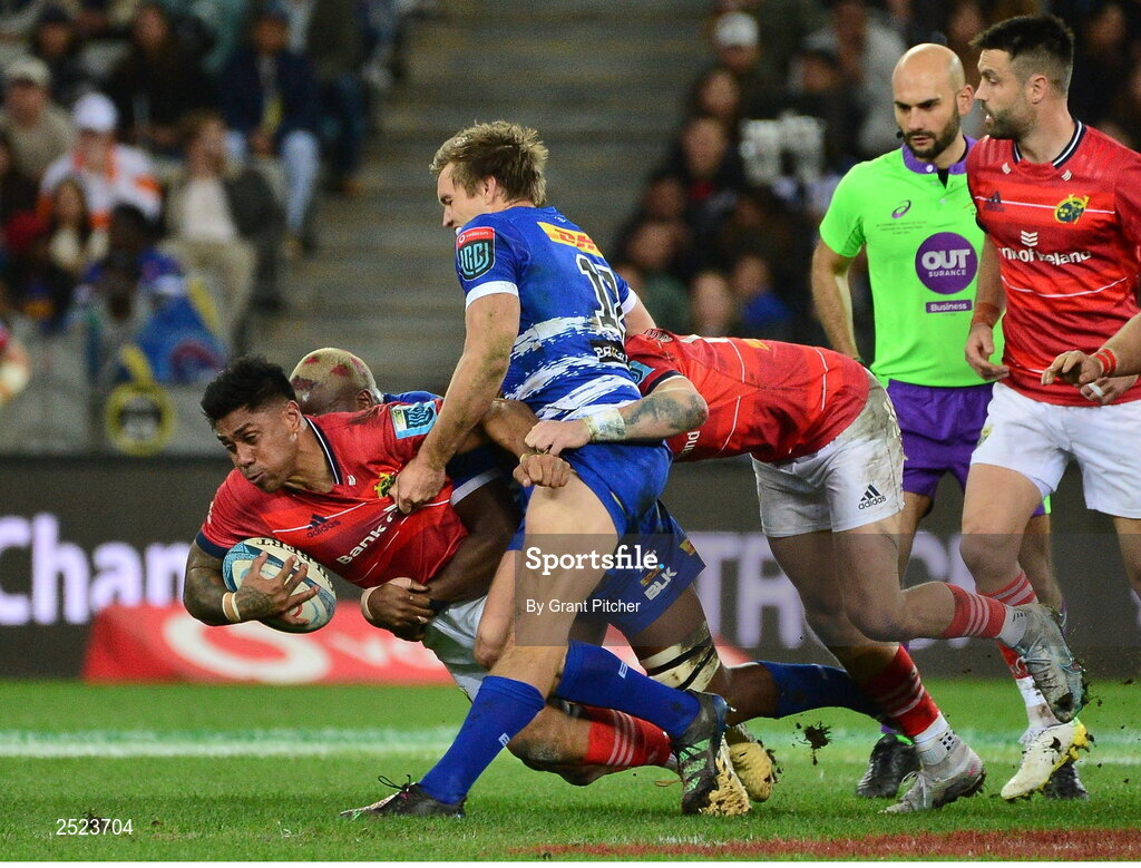 27 May 2023; Malakai Fekitoa of Munster is tackled by Dan du Plessis and Hacjivah Dayimani of DHL Stormers during the United Rugby Championship Final match between DHL Stormers and Munster at DHL Stadium in Cape Town, South Africa. Photo by Grant Pitcher/Sportsfile