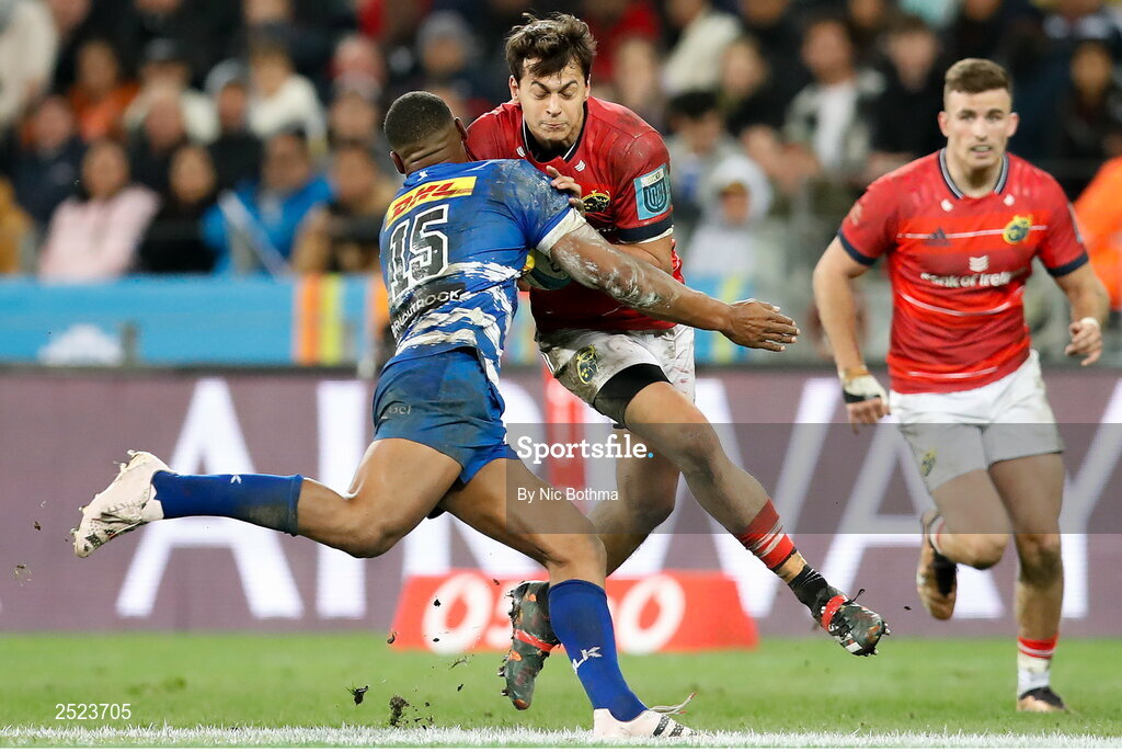 27 May 2023; Antoine Frisch of Munster is tackled by Damian Willemse of DHL Stormers during the United Rugby Championship Final match between DHL Stormers and Munster at DHL Stadium in Cape Town, South Africa. Photo by Nic Bothma/Sportsfile