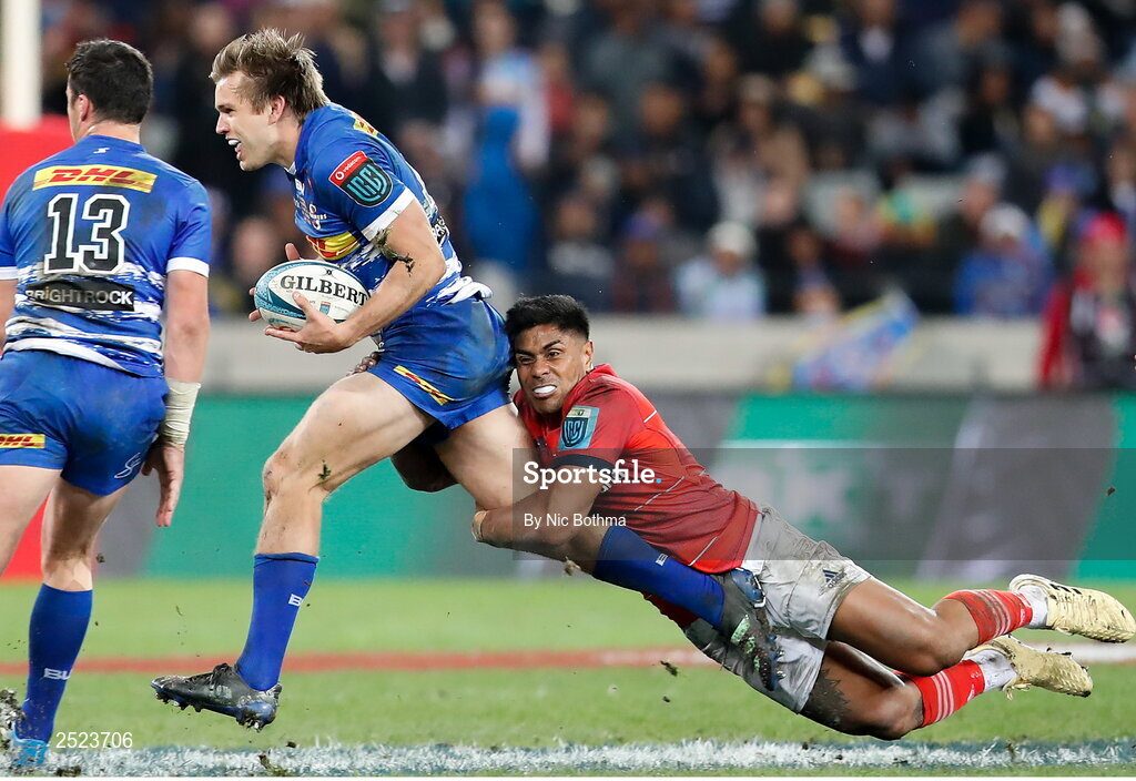 27 May 2023; Dan du Plessis of DHL Stormers is tackled by Malakai Fekitoa of Munster during the United Rugby Championship Final match between DHL Stormers and Munster at DHL Stadium in Cape Town, South Africa. Photo by Nic Bothma/Sportsfile