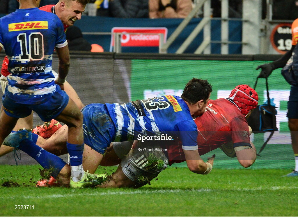 27 May 2023; John Hodnett of Munster scores his second and hi sside's winning try despite the tackle of Ruhan Nel of DHL Stormers during the United Rugby Championship Final match between DHL Stormers and Munster at DHL Stadium in Cape Town, South Africa. Photo by Grant Pitcher/Sportsfile