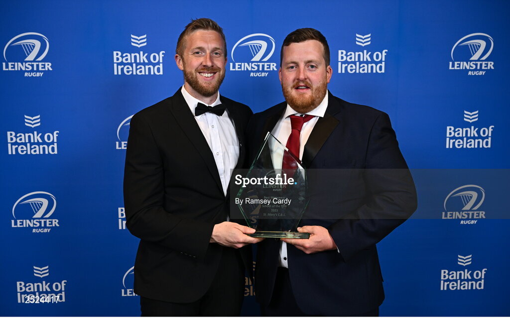 28 May 2023; Brian Glavin, left, and Conor Ryan of St Mary's CBS, Portlaoise, with the Best Menswear Development School of the Year award at the Leinster Rugby Awards Ball, which took place at the Clayton Hotel Burlington Road in Dublin, was a celebration of the 2022/23 Leinster Rugby season. Photo by Ramsey Cardy/Sportsfile