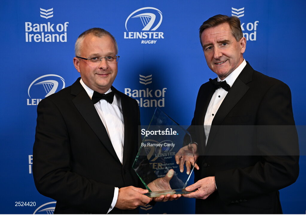 28 May 2023; Damon McCaul of Gonzaga College is presented Beauchamps School of the Year award by Edward Evans of Beauchamps at the Leinster Rugby Awards Ball, which took place at the Clayton Hotel Burlington Road in Dublin, was a celebration of the 2022/23 Leinster Rugby season. Photo by Ramsey Cardy/Sportsfile