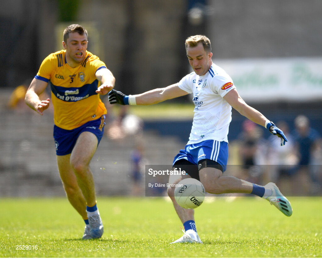 4 June 2023; Jack Mc Carron of Monaghan in action against Cillian Brennan of Clare during the GAA Football All-Ireland Senior Championship Round 2 match between Monaghan and Clare at St Tiernach's Park in Clones, Monaghan. Photo by Daire Brennan/Sportsfile