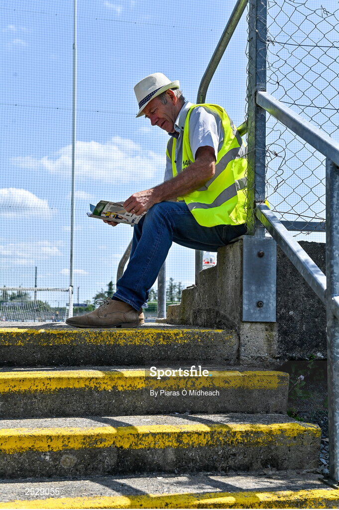 4 June 2023; Steward Junior Caslin, from Kilmore, reads the programme before the GAA Football All-Ireland Senior Championship Round 2 match between Roscommon and Sligo at Dr Hyde Park in Roscommon. Photo by Piaras Ó Mídheach/Sportsfile