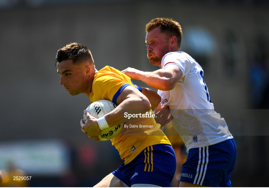 4 June 2023; Jamie Malone of Clare in action against Ryan Mc Anespie of Monaghan during the GAA Football All-Ireland Senior Championship Round 2 match between Monaghan and Clare at St Tiernach's Park in Clones, Monaghan. Photo by Daire Brennan/Sportsfile
