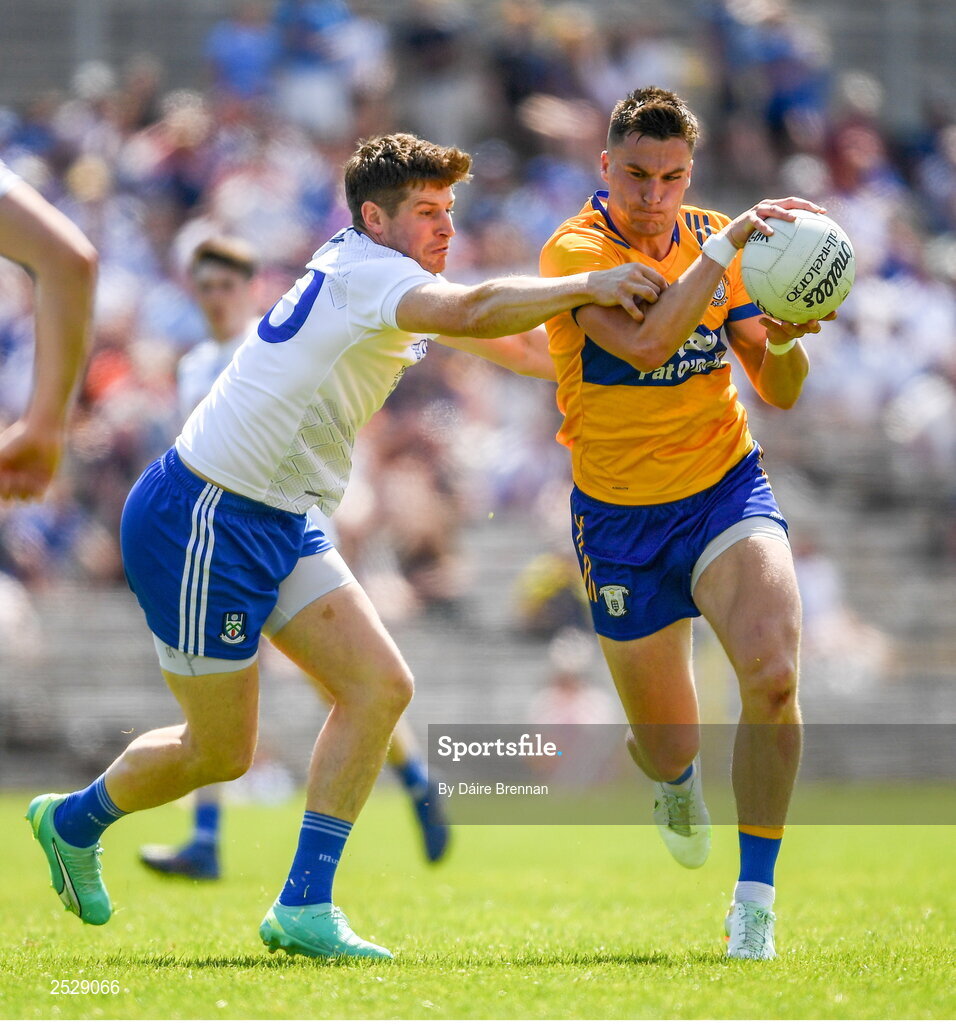 4 June 2023; Jamie Malone of Clare in action against Darren Hughes of Monaghan during the GAA Football All-Ireland Senior Championship Round 2 match between Monaghan and Clare at St Tiernach's Park in Clones, Monaghan. Photo by Daire Brennan/Sportsfile