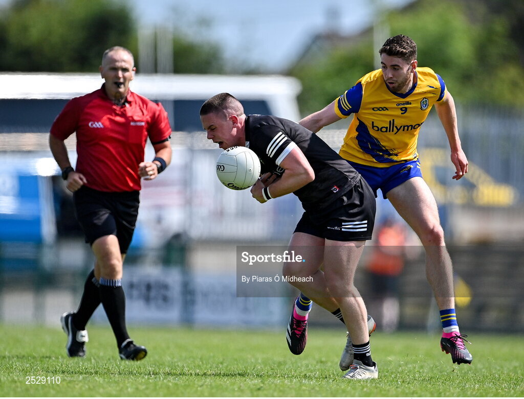 4 June 2023; Paul McNamara of Sligo in action against Eddie Nolan of Roscommon during the GAA Football All-Ireland Senior Championship Round 2 match between Roscommon and Sligo at Dr Hyde Park in Roscommon. Photo by Piaras Ó Mídheach/Sportsfile