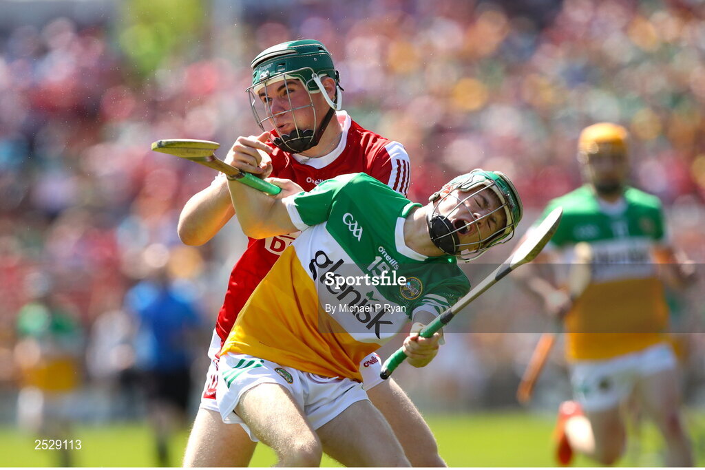4 June 2023; Adam Screeney of Offaly in action against Shane Kingston of Cork during the O’Neills.com GAA Hurling All-Ireland U20 Championship Final match between Cork and Offaly at FBD Semple Stadium in Thurles, Tipperary. Photo by Michael P Ryan/Sportsfile