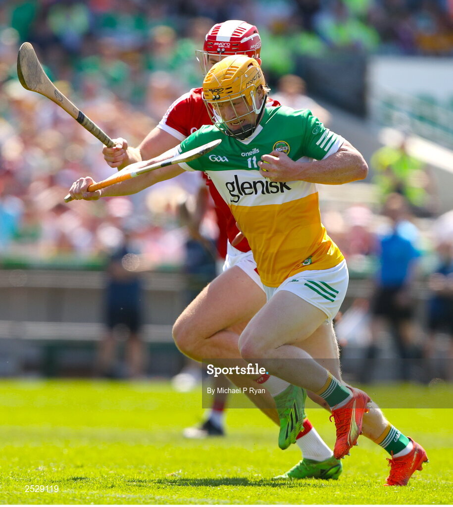 4 June 2023; Cormac Egan of Offaly in action against Ben O'Connor of Cork during the O’Neills.com GAA Hurling All-Ireland U20 Championship Final match between Cork and Offaly at FBD Semple Stadium in Thurles, Tipperary. Photo by Michael P Ryan/Sportsfile