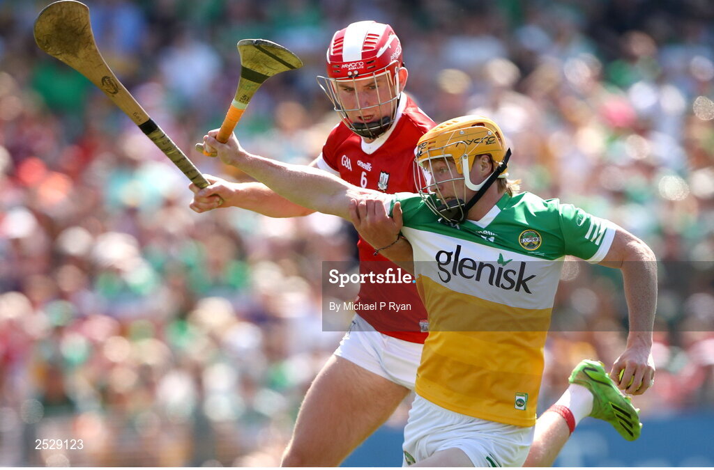 4 June 2023; Cormac Egan of Offaly in action against Ben O'Connor of Cork during the O’Neills.com GAA Hurling All-Ireland U20 Championship Final match between Cork and Offaly at FBD Semple Stadium in Thurles, Tipperary. Photo by Michael P Ryan/Sportsfile