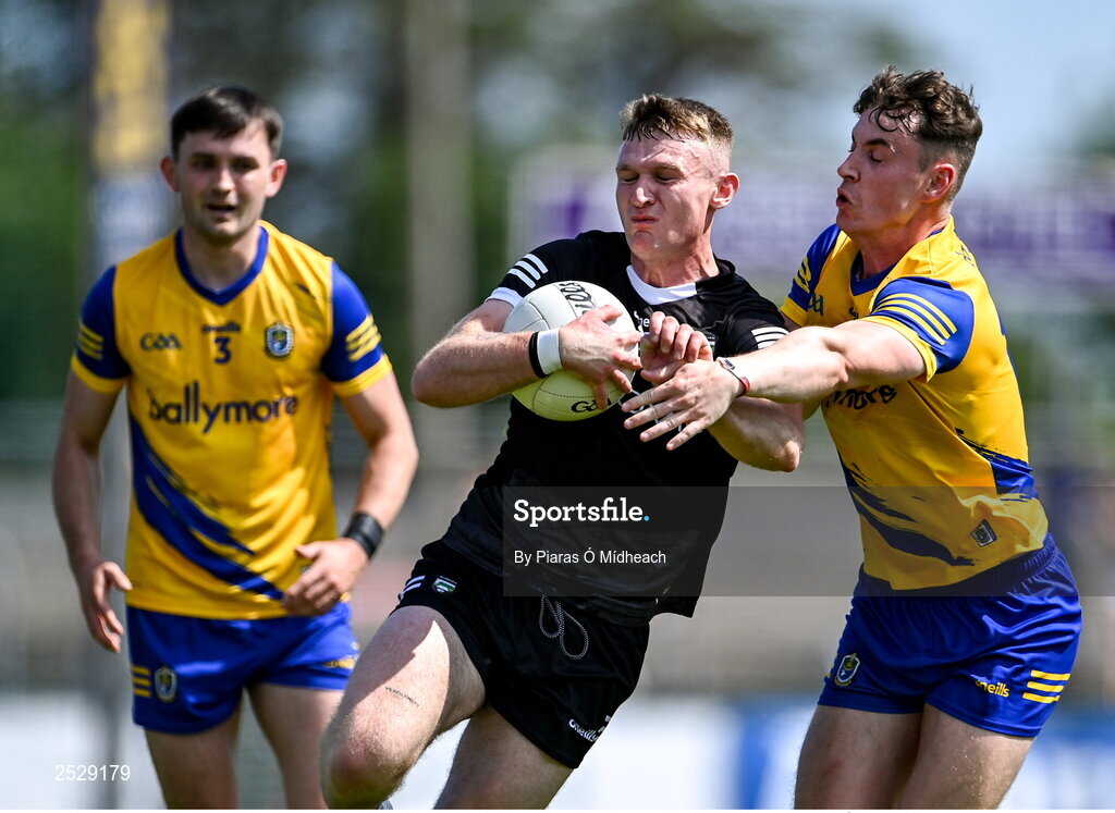 4 June 2023; Alan Reilly of Sligo in action against Cian McKeon of Roscommon during the GAA Football All-Ireland Senior Championship Round 2 match between Roscommon and Sligo at Dr Hyde Park in Roscommon. Photo by Piaras Ó Mídheach/Sportsfile
