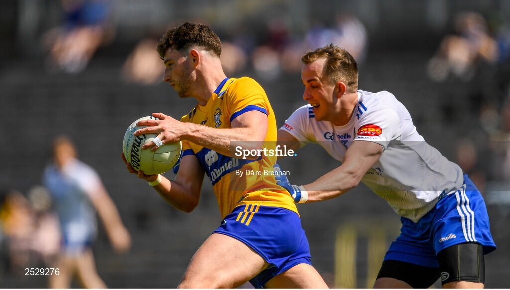 4 June 2023; Ronan Lanigan of Clare in action against Jack McCarron of Monaghan during the GAA Football All-Ireland Senior Championship Round 2 match between Monaghan and Clare at St Tiernach's Park in Clones, Monaghan. Photo by Daire Brennan/Sportsfile